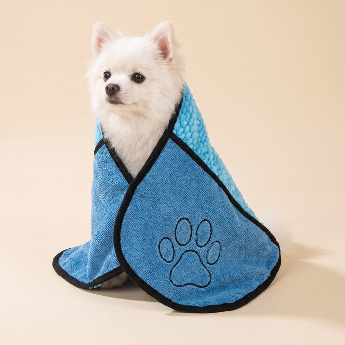 Pomeranian in the dog drying robe